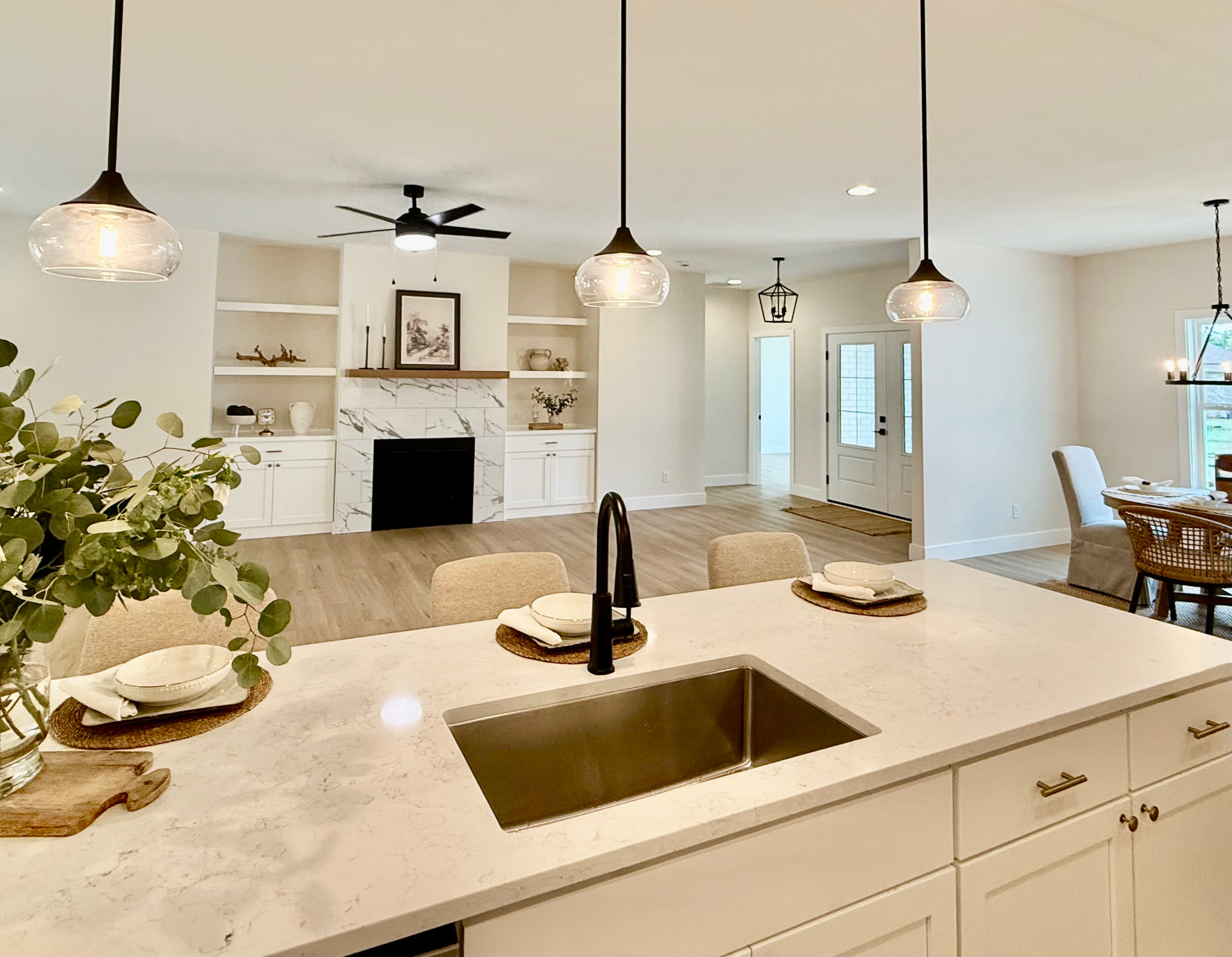 Bright open-concept kitchen and living area inside a new construction Sterchi home in Evansville, Indiana